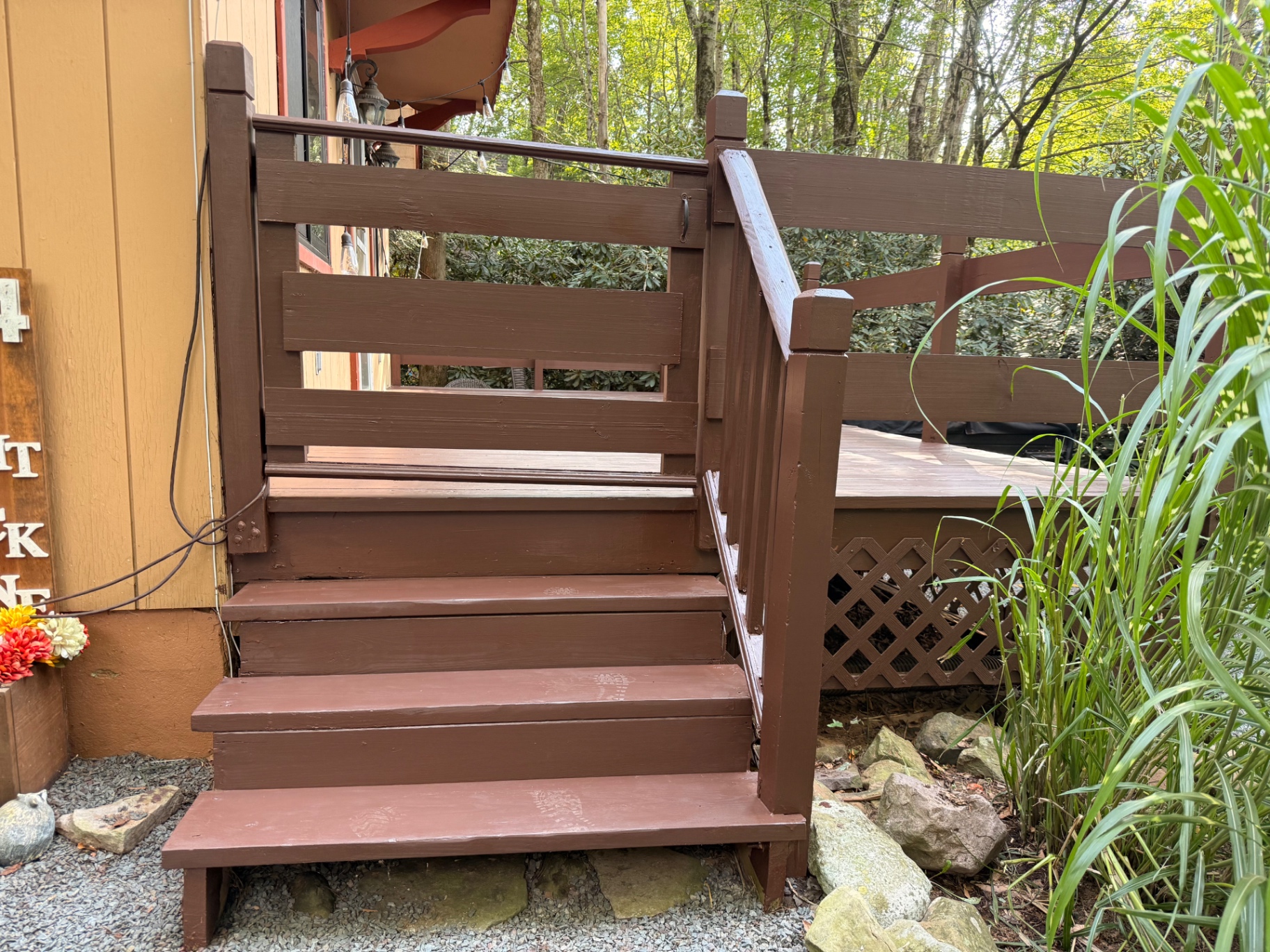 Refinished brown deck steps after restoration