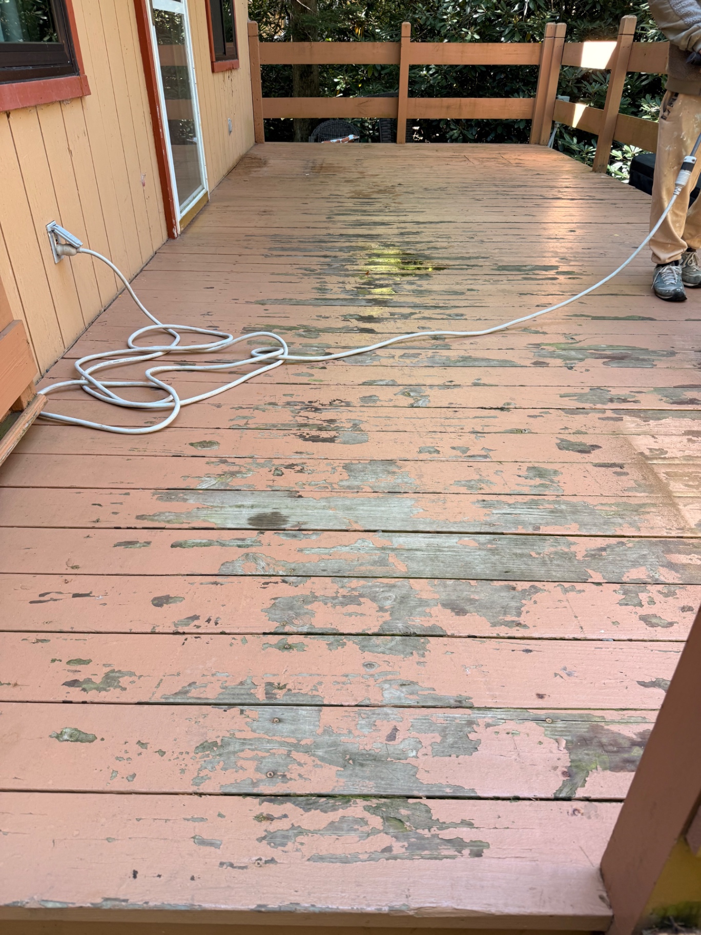 Peeling deck surface before restoration